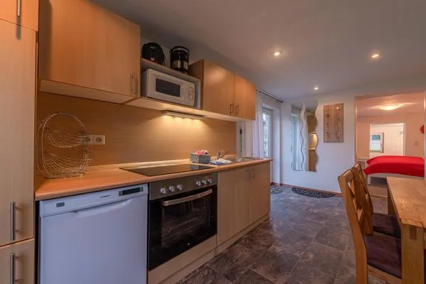 Ferienwohnung Graureiher Blick in die Küche  Graureiher