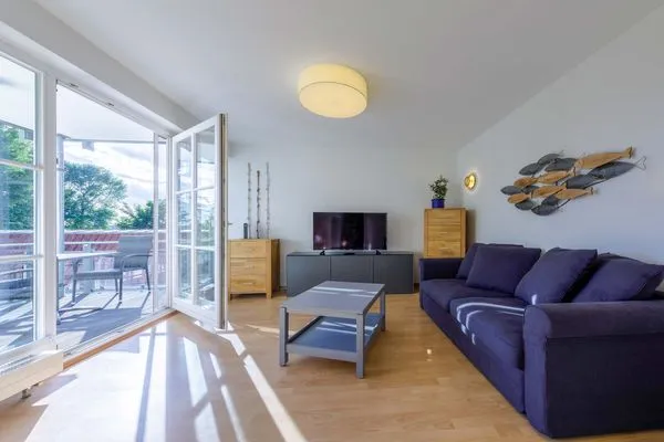 Ferienwohnung Jolle Waren Müritz - Wohnraum mit gemütlicher Sitzecke  Jolle