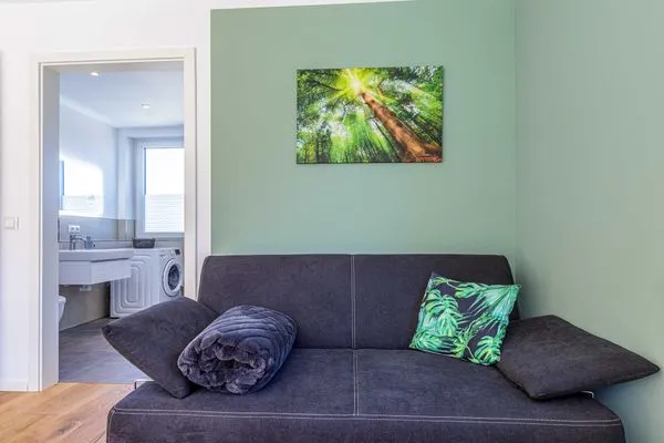 Ferienwohnung SeeGlück Couch im Schlafzimmer  SeeGlück