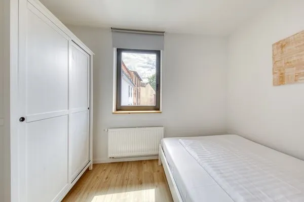 Ferienwohnung Family Suite Schlafzimmer mit Einzelbett  Family Suite