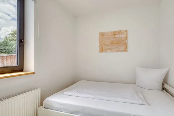 Ferienwohnung Family Suite Blick in eines der Schlafzimmer  Family Suite