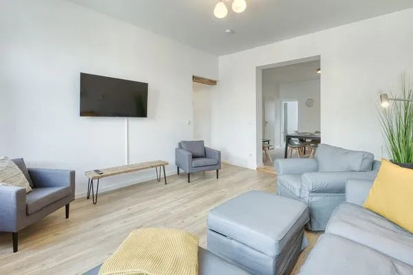 Ferienwohnung Family Suite Wohnbereich mit TV  Family Suite