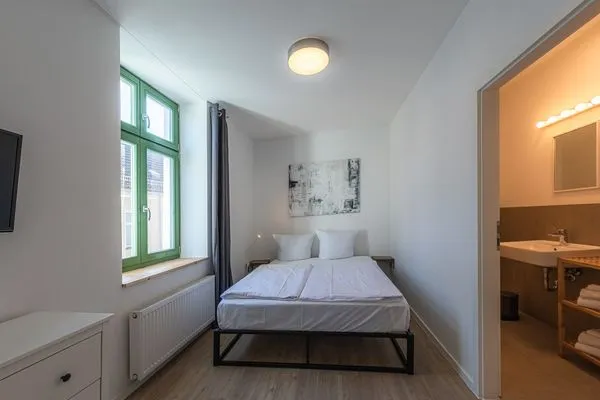 Ferienwohnung Family Suite Schlafzimmer mit privatem Badezimmer  Family Suite