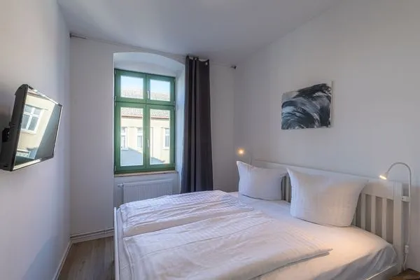 Ferienwohnung Family Suite Blick in eines der Schlafzimmer  Family Suite