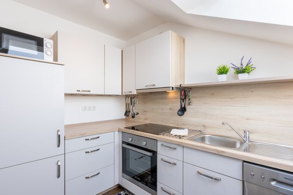  Ferienwohnung Griabig Ferienwohnungen in Schwangau - Küche, Essbereich, Wohnzimmer