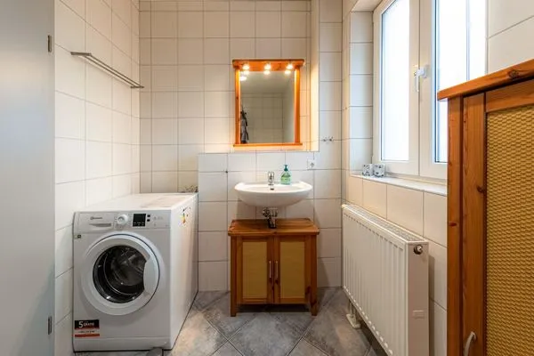 Ferienwohnung Siegel Waren (Müritz) - Badezimmer mit Waschmaschine  Siegel