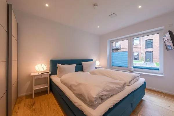 Ferienwohnung Inselpirat Malchow - Schlafzimmer mit Doppelbett  Inselpirat