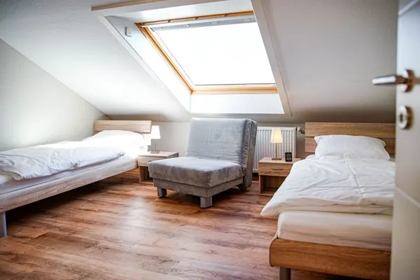 Schlafzimmer  FeWo Siebenstern****