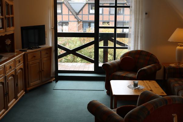  Ferienwohnung Kiebitz Werdum - Wohnzimmer