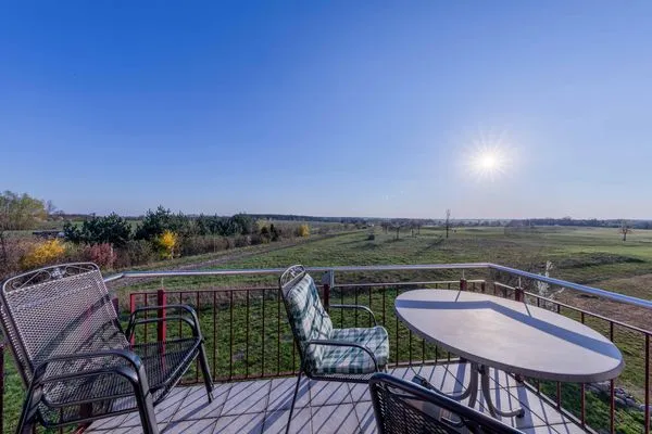 Ferienwohnung Storchenhorst Göhren-Lebbin - Ausblick vom Bslkon mit Blick in die Natur  Storchenhorst