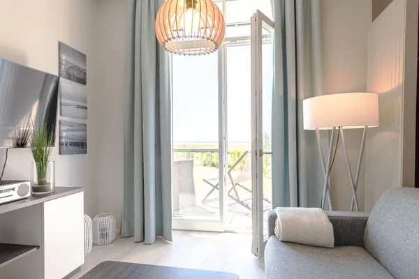 Ferienwohnung Strandflieder Oseebad Wustrow gemütlicher Wohnbereich mit Außenzugang  Strandflieder