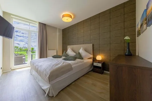 Ferienwohnung Gänseblümchen Ostseebad Wustrow - Schlafzimmer mit Doppelbett  Gänseblümchen