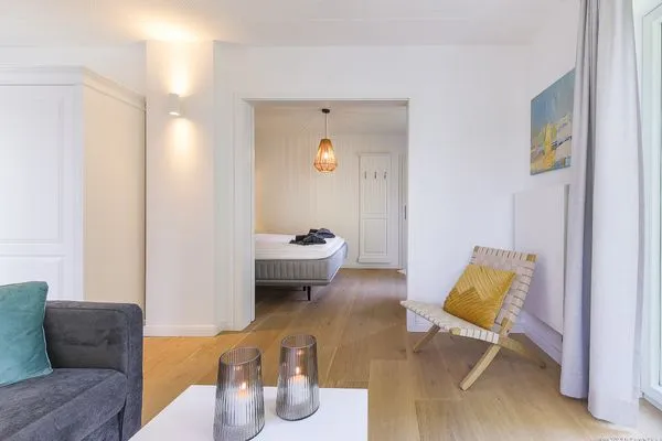 Wohnzimmer Haffperle Meerblau - zentral in Haffkrug, nur wenige Schritte zum Strand