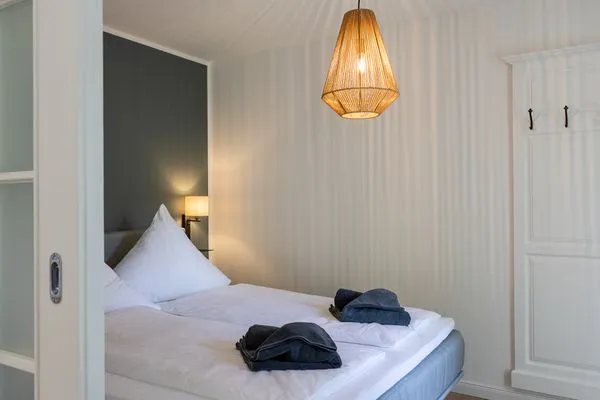 Schlafzimmer Haffperle Meerblau - zentral in Haffkrug, nur wenige Schritte zum Strand