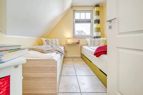 Schlafzimmer mit zwei Einzelbetten Mühlenstrasse 23 - Wohnung Boddenstern