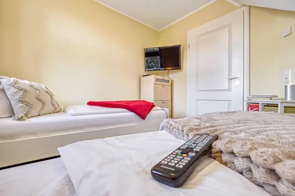 Schlafzimmer mit zwei Einzelbetten Mühlenstrasse 23 - Wohnung Boddenstern