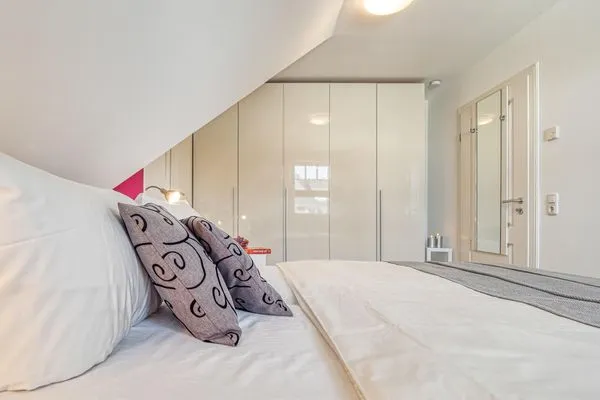 Schlafzimmer mit Doppelbett Mühlenstrasse 23 - Wohnung Boddenstern