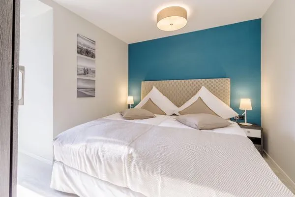 Ferienwohnung Lüttkoje Ostseebad Wustrow - ZweiWasser Alte Seefahrtschule Schlafzimmer  Lüttkoje