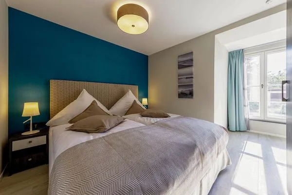 Ferienwohnung Lüttkoje Ostseebad Wustrow - ZweiWasser Alte Seefahrtschule Schlafzimmer  Lüttkoje