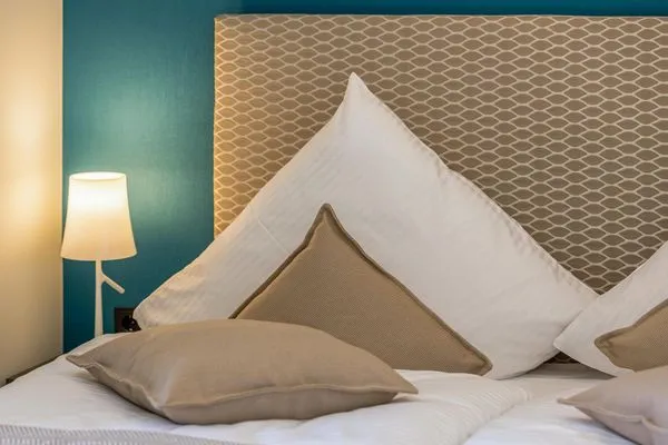 Ferienwohnung Lüttkoje Ostseebad Wustrow - ZweiWasser Alte Seefahrtschule Schlafzimmer  Lüttkoje