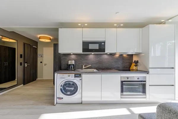 Ferienwohnung Lüttkoje Ostseebad Wustrow - ZweiWasser Alte Seefahrtschule Küche  Lüttkoje