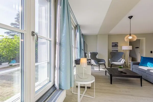 Ferienwohnung Lüttkoje Ostseebad Wustrow - ZweiWasser Alte Seefahrtschule Wohnzimmer  Lüttkoje