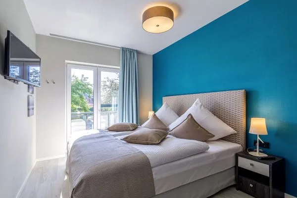 Ferienwohnung Wiesenkieker Ostseebad Wustrow - ZweiWasser Alte Seefahrtschule Schlafzimmer  Wiesenkieker