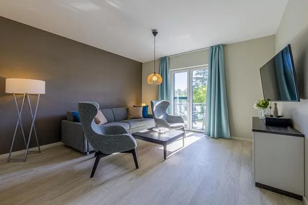 Ferienwohnung Wiesenkieker Ostseebad Wustrow - ZweiWasser Alte Seefahrtschule Wohnzimmer  Wiesenkieker