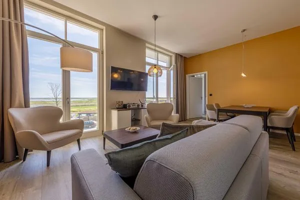 Ferienwohnung Wellenreiter Ostseebad Wustrow - ZweiWasser Alte Seefahrtschule Wohnzimmer  Wellenreiter