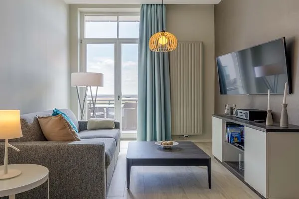 Ferienwohnung Sandwelle Ostseebad Wustrow ZweiWasser Alte Seefahrtschule Wohnzimmer  Sandwelle