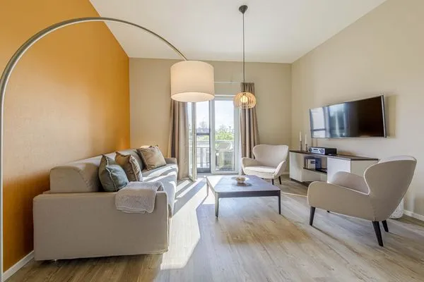 Ferienwohnung Humboldsuite Ostseebad Wustrow ZweiWasser Alte Seefahrtschule Gemütliches Wohnzimmer  Humboldtsuite