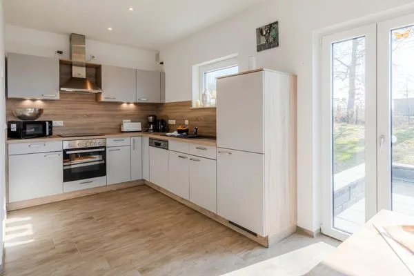 Ferienhaus SchönSicht Blick auf die offene Küche  SchönSicht