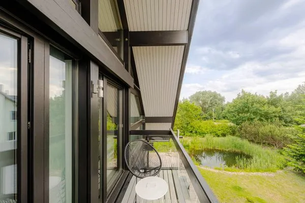 Ferienhaus HUF-Haus in Waren (Müritz) Blick auf den Balkon  HUF-Haus