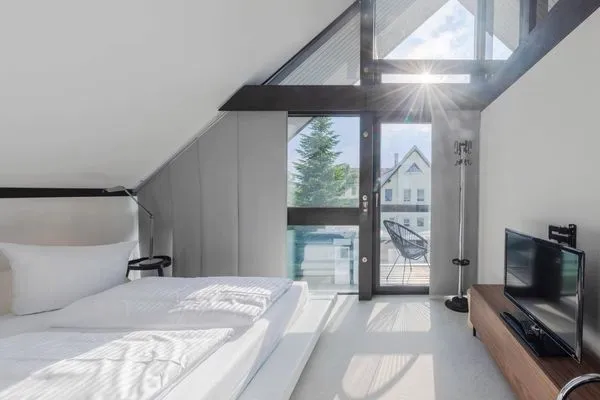 Ferienhaus HUF-Haus in Waren (Waren Müritz) Blick in das Schlafzimmer im Obergeschoss  HUF-Haus