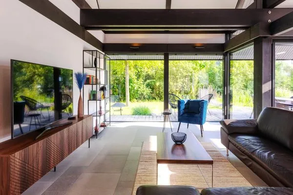 Ferienhaus HUF-Haus in Waren (Waren Müritz) Wohnzimmer mit TV  HUF-Haus