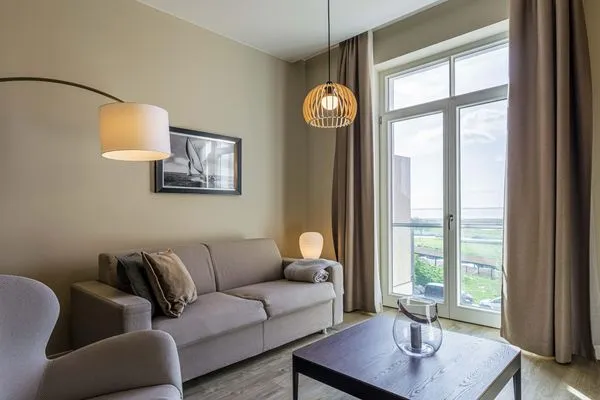 Ferienwohnung Ostseeglück Ostseebad Wustrow ZweiWasser Alte Seefahrtschule Wohnzimmer  Ostseeglück