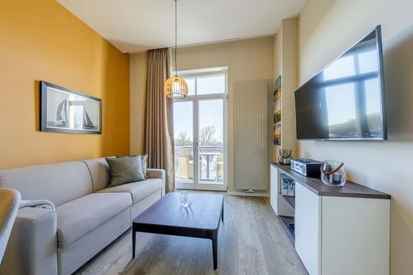 Ferienwohnung Ostseezeit Ostseebad Wustrow ZweiWasser Alte Seefahrtschule Wohnzimmer  Ostseezeit