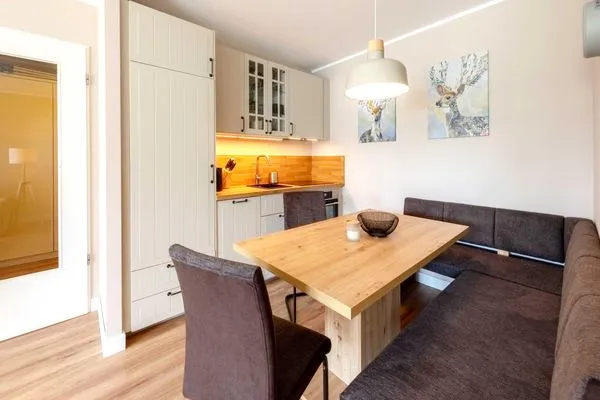 Ferienwohnung Aparthotel Zingst Heymat - Kochnische mit Sitzgruppe  Heymat
