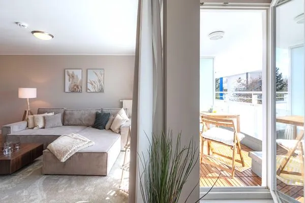 Ferienwohnung Aparthotel Zingst Heymat - Wohnzimmer  Heymat