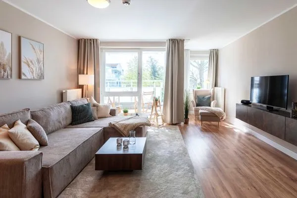 Ferienwohnung Aparthotel Zingst Heymat - Wohnzimmer  Heymat