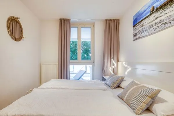 Ferienwohnung Ostseeblick Aparthotel Zingst - Schlafzimmer  Ostseeblick