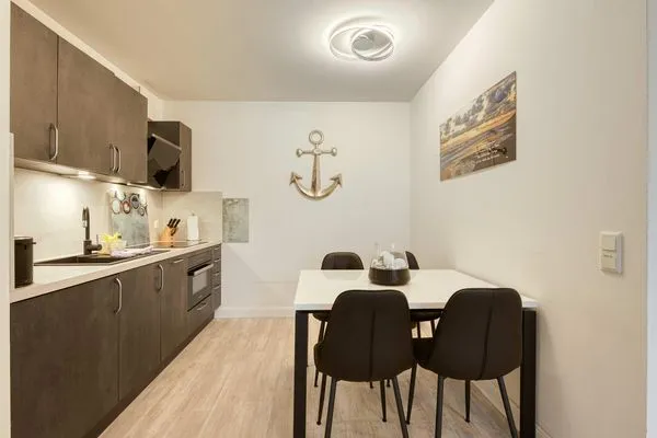 Ferienwohnung Ostseeschatz Aparthotel Zingst - Küchenzeile mit Esstisch  Ostseeschatz
