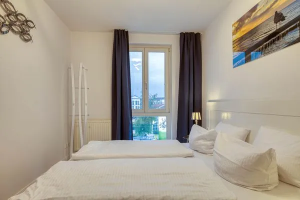 Ferienwohnung Ostseeschatz Aparthotel Zingst - Schlafzimmer  Ostseeschatz