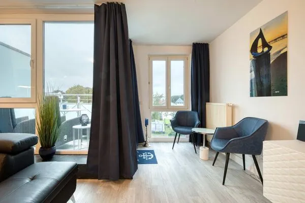 Ferienwohnung Ostseeschatz Aparthotel Zingst - Wohnzimmer  Ostseeschatz