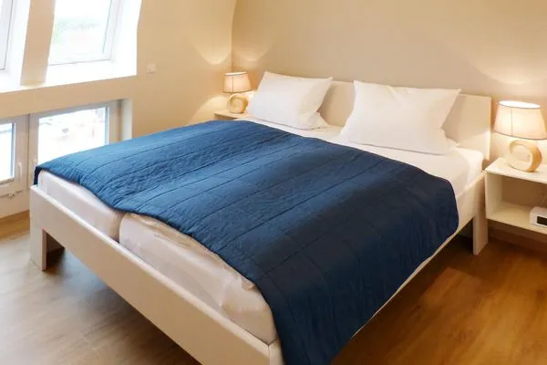 1. Schlafzimmer in der Ferienwohnung Weiße Düne 7 in Wittdün auf Amrum Haus *Weiße Düne* Ferienwohnung *Weiße Düne 7*