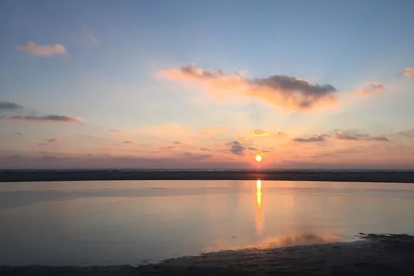 Sonnenuntergang über dem Watt Haus *Weiße Düne* Ferienwohnung *Weiße Düne 7*