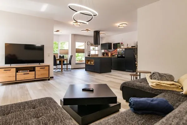 Wohnzimmer, mit großem TV  Ferienwohnung Hopf