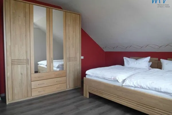 Schlafzimmer Ferienhaus Kiebitzdelle-Leegde 10 Ferienwohnung Backhaus