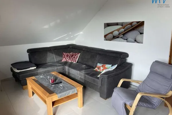 Wohnzimmer Ferienhaus Kiebitzdelle-Leegde 10 Ferienwohnung Backhaus