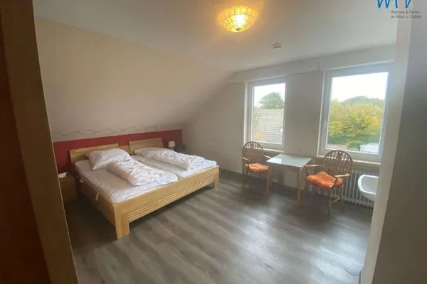 Schlafzimmer Ferienhaus Kiebitzdelle-Leegde 10 Ferienwohnung Backhaus
